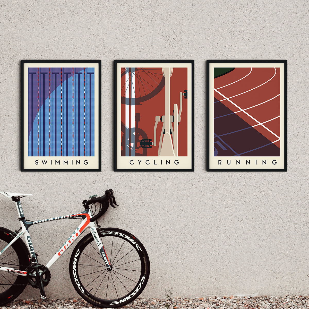 Minimalist print set of Triathlon features a close-up swimming pool resembling an Olympic pool, an aerial view of a bicycle on a red road, and a running track