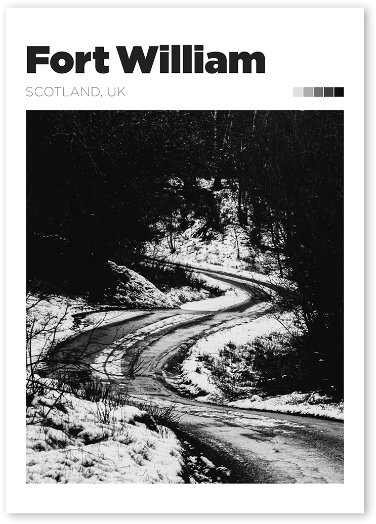 A unique black and white photo of a stunning snowy road in Fort William, Scotland